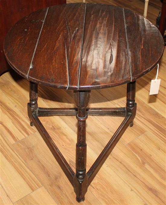 An 18th century and later oak and fruitwood cricket table, W.2ft 1in.